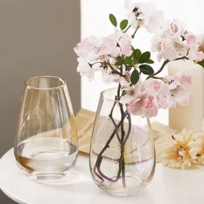 Clear glass vase with luster outside